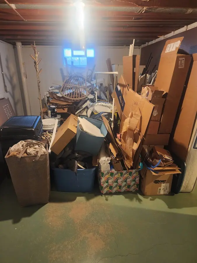 Roll-off dumpster container at job site for Construction Dumpster Rental in Orchidlands Estates